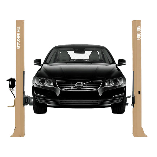 Thinkcar TVL 240 elevador electrohidráulico de 2 postes con travesaño inferior, capacidad de 4000 kg. Ideal para talleres con techos bajos, garantiza estabilidad y seguridad en cada servicio.